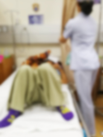 Blurred images of patients and the work of nurses in the ICU room.の写真素材
