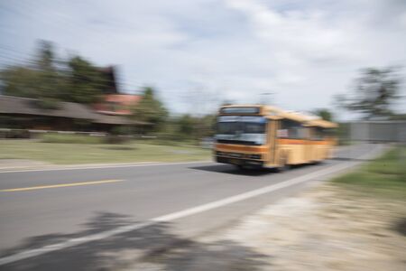 The car uses a blur speed as a background or wallpaperの写真素材