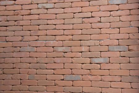 Red brick wall on old architectural surface wallpaper.