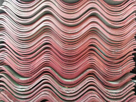 Many tiles overlap.close up old dirty tile roof textureの写真素材