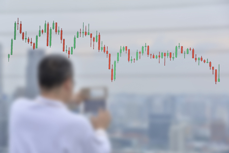 Trading graph on the and world map background,Business financial concept