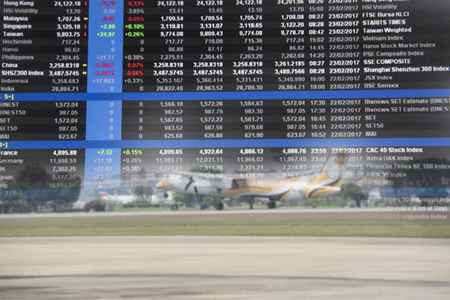 Analysts analyze profitability with performance graphsの写真素材