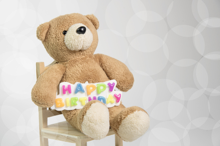 Teddy Bear with happy birthday signの写真素材