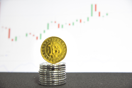 Bitcoins and New Candle stick graph chart and digital backgroundの写真素材