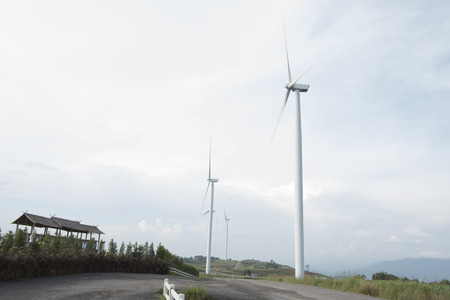 Wind Turbine with Cloudy Sky  as background or wallpaper.の写真素材