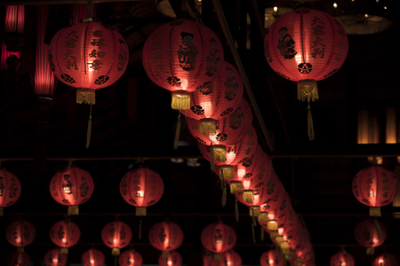 Red lanterns, oriental charm as background or wallpaper.の写真素材