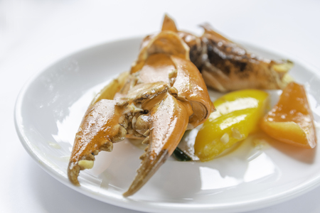 Crab Claw seafood on ice on white plate as background or wallpaper.の写真素材