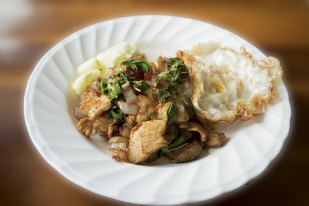 Fried basil leave with pork and Fried egg as background or wallpaper.の写真素材