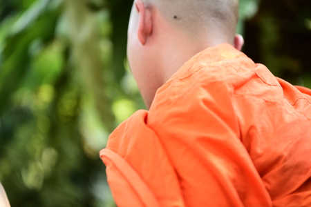 Yellow robe of Buddhist monk pattern background.の写真素材