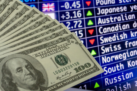 Currency, index investors in the stock market on the trading background