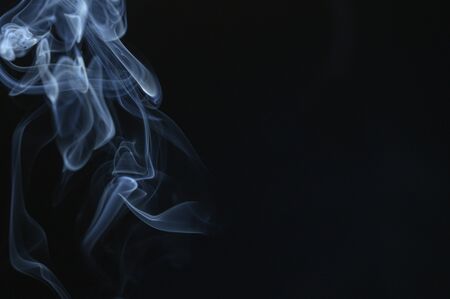 abstract smoke wallpaper on black backgroundの写真素材