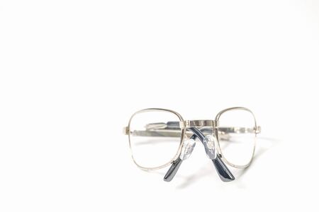 Presbyopia glasses on a white backgroundの写真素材