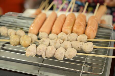 grilled meatball at street food in thailandの写真素材