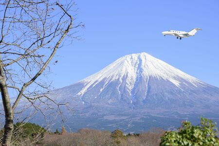 The plane flew over the view from Lake Kawaguchiko in Japanの写真素材