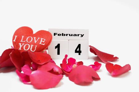 February 14, Valentine's Day, heart shaped with red rose petalsの写真素材