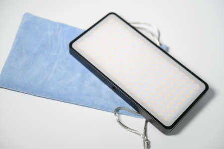 Continuous light source led with cloth on white backgroundの写真素材