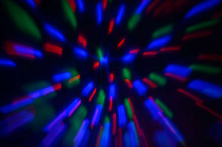 Colorful abstract light lines on black backgroundの写真素材