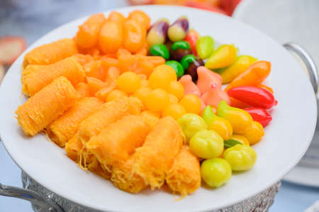 Beautiful colorful Thai desserts on abstract backgroundの写真素材