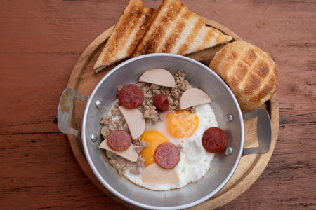 Pan Fried Egg with Pork and Breadの写真素材