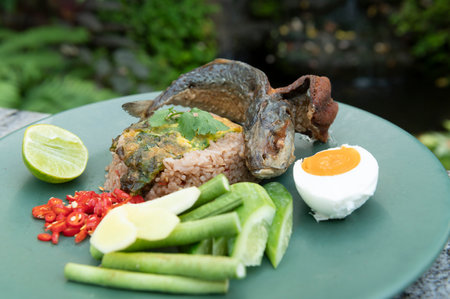 Fried mackerel chili paste with salted egg and various rest on food and beverage backgroundの写真素材