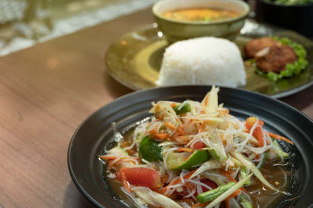 Food and beverages Fresh papaya salad, Papaya salad and Isan style vermicelli in Thai restaurantsの写真素材