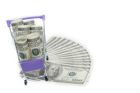 Hundred dollar bills on a small cart, business concept background with copy spaceの写真素材