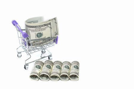 Hundred dollar bills on a small cart, business concept background with copy spaceの写真素材