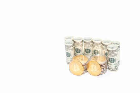 Circular rolled dollar bills with bitcoins on white background business concept back with copy spaceの写真素材