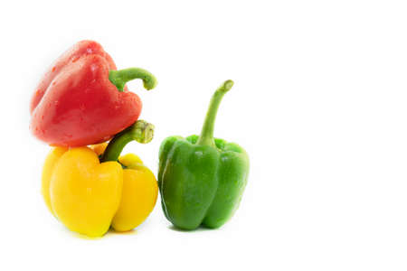 Three bell peppers stacked with cut-out background on food abstract.の写真素材