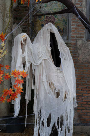 White hooded ghost Halloween grunge backgroundの写真素材