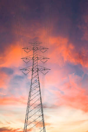 high voltage pole tower on abstract structure energy concept technology background
