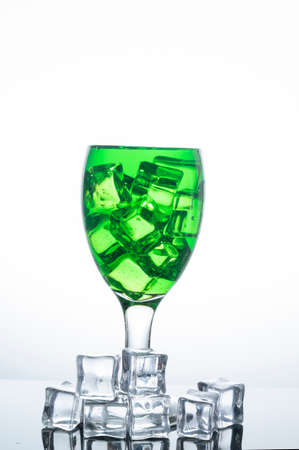 Fresh green nectar in clear glass with ice on food and drink concept.の写真素材