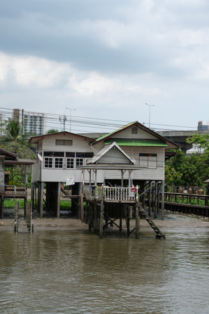 Old house along the Thai canal, elevated in Bangkok on creativity outside the houseの写真素材