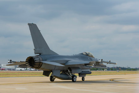 Fighter plane with pilot taking off on technology background