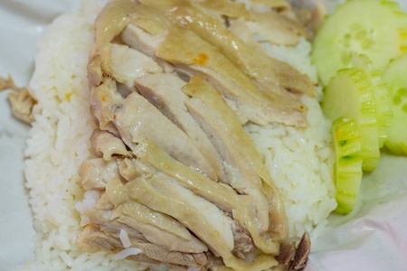 Hainanese chicken rice, steamed chicken and white riceの写真素材