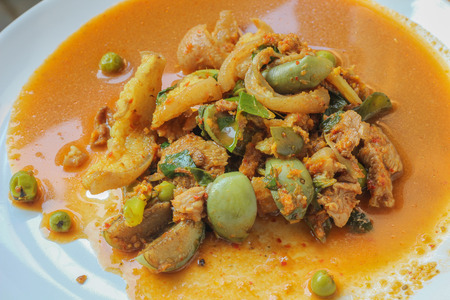 Spicy Boar mixed with spices on plateの写真素材