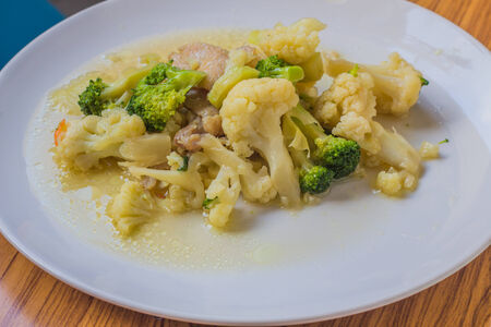 Cauliflower fried with oyster sauce in Thailand ingredient  -Cauliflower and Broccoli -oyster sauce  -porkの写真素材