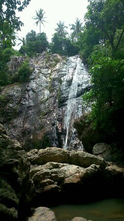 Nam Tok Na Muang Waterfall, Samui island Thailand.の素材