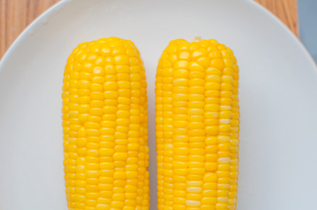 Boiled corn on white bowl.Thai foods.の写真素材