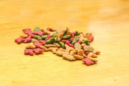 Cat Food, granules on wooden backgroundの写真素材