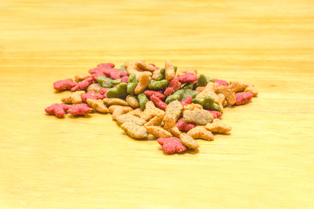 Cat Food, granules on wooden backgroundの写真素材