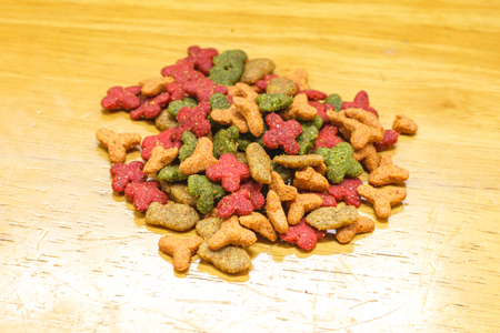 Cat Food, granules on wooden backgroundの写真素材