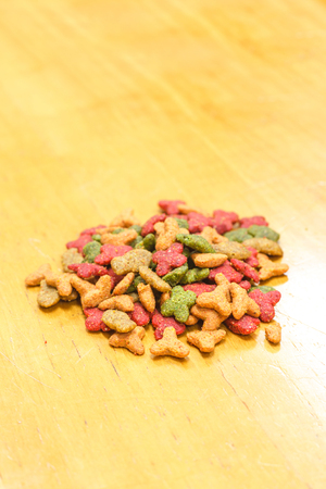 Cat Food, granules on wooden backgroundの写真素材