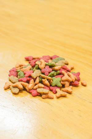 Cat Food, granules on wooden backgroundの写真素材