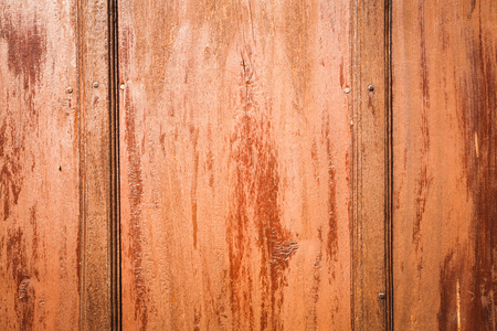 wood background with knots and nail holesの写真素材