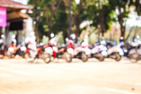 blur image of the parking motorbikes on outdoorsの写真素材