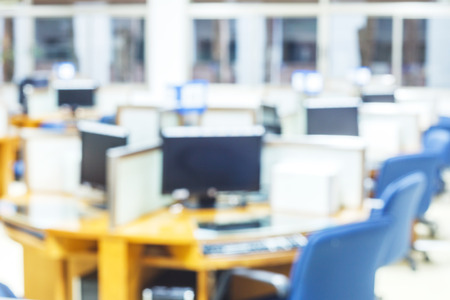 blur image of the computer on libraryの写真素材