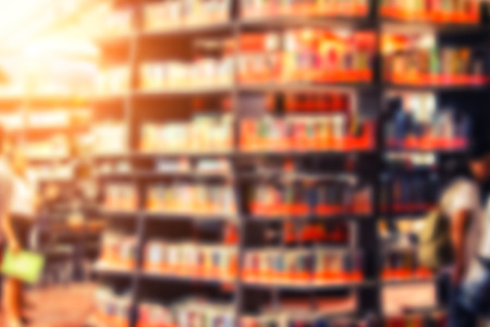 blur image of the library or Book shelf Knowledge and Research in Education and sun lightの写真素材