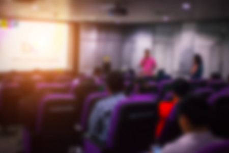 Blur image of peoples on the conference rooms in the University and light