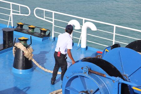 SAMUI ISLAND MAY-28: Boats to the island and employee is prepared to dock on the island on may 28, 2015 at Samui Island , Suratthani Thailand.のeditorial素材